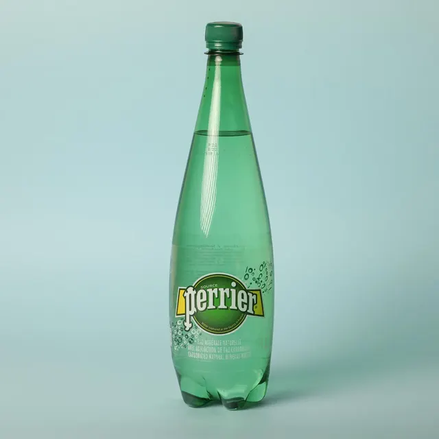 Agua mineral natural con gas Perrier 1l.